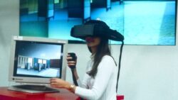 User wearing virtual reality glasses at EuroShop 1996